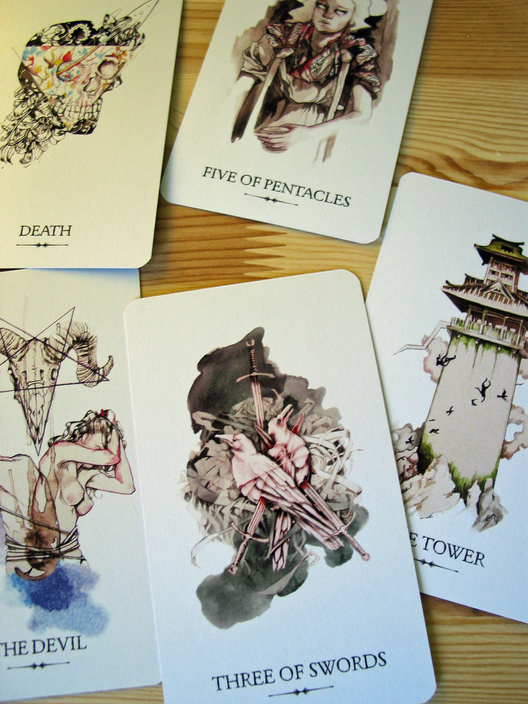 Some of the darker cards in the deck: Death, Five of Pentacles, The Tower, Three of Swords, the Devil