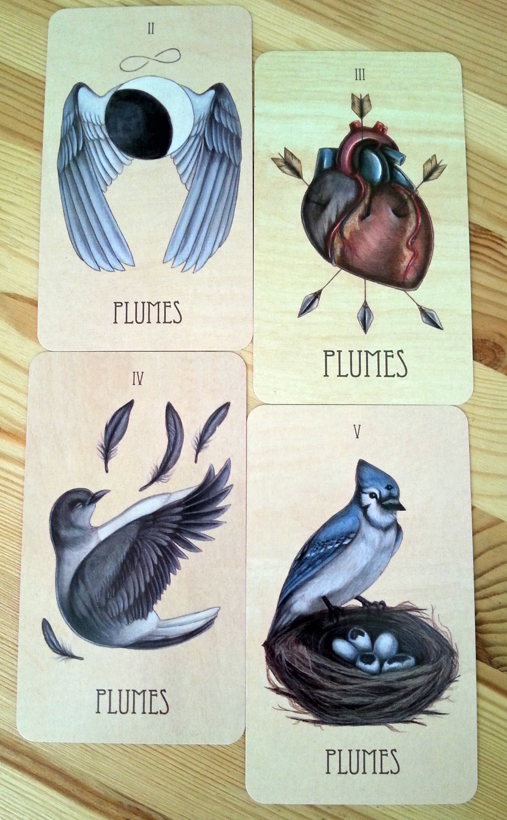 The Wooden Tarot: Suit of Plumes 2-5